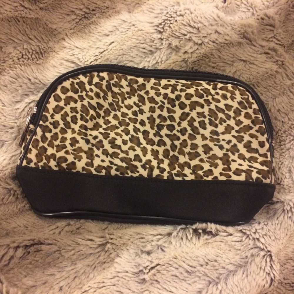 Leopard print Lancôme make up bag